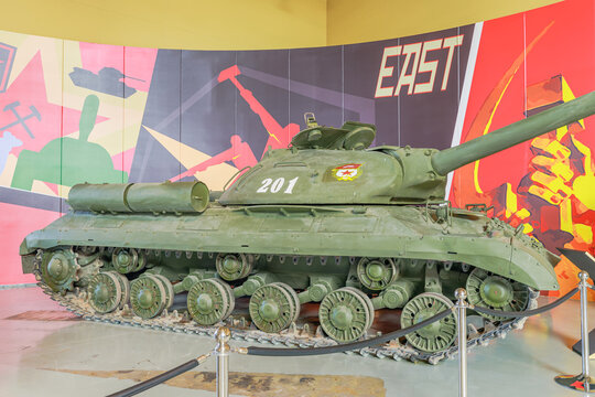 Royal Tank Museum, Amman, Jordan - May 4, 2024: Well-preserved Soviet IS-3 heavy tank from world war ii era exhibited in the Royal Tank Museum of Jordan under dramatic lighting