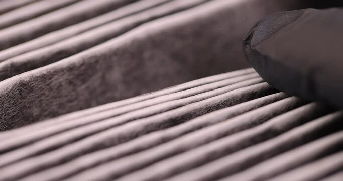 an old dirty air filter, a dirty long-used air purification filter