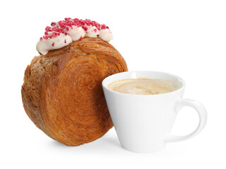 Round croissant with cream and cup of coffee isolated on white. Tasty puff pastry