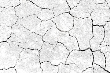 Texture soil dry crack background pattern of drought lack of water of nature white black old broken.