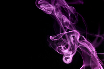 Close up of smoke swirl on black background