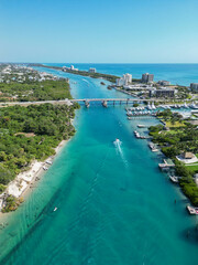 Boats in the intracoastal waterway on the barrier island of Jupiter Island in Palm Beach County,...