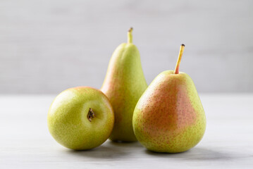 Fresh pear fruit on white table, Healthy eating