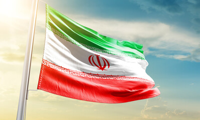 Iran national flag waving in beautiful sky.