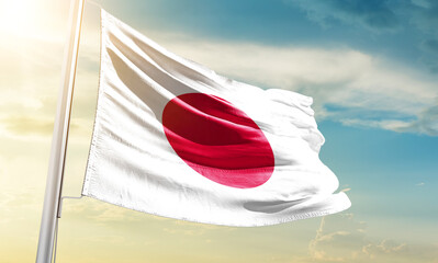 Japannational flag waving in beautiful sky.
