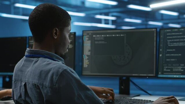 IT specialist in server farm ensuring valuable data remains shielded from potential threats, safeguarding against unauthorized access and vulnerabilities, securing system from virus attacks