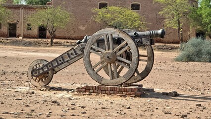 Antique Cannon with Wooden Wheels in the Derawar Fort in Cholistan Desert, Pakistan 