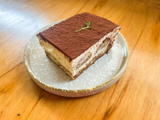 Tiramisu Cake is an Italian dessert made of ladyfinger pastries dipped in coffee.