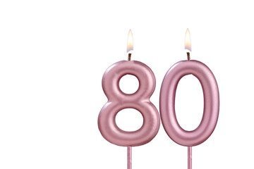 Candle number 80 - Lit birthday candle on white background