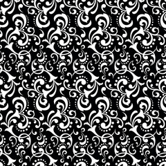 Flower pattern. Seamless white and black ornament. Graphic vector background. Ornament for fabric, wallpaper, packaging.