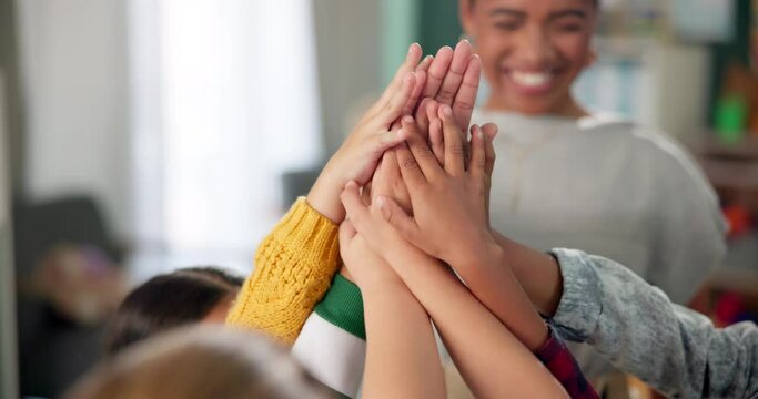Children, hands and classroom for success or teamwork at school, learning and development with friends. Young, kids and collaboration at kindergarten with teacher for support, together for education