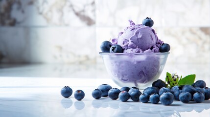 Blueberry ice cream and blueberries in bowl