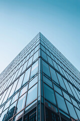 Obraz premium Awe-inspiring exterior facade of contemporary office skyscraper with sleek glass windows