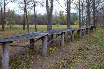 autumn park, which houses objects made of wood for recreation and people's time, an open-air museum