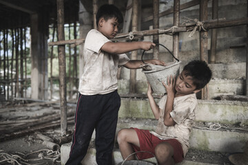 Poor children work in construction sites because of poverty, Child labor, human trafficking, World...