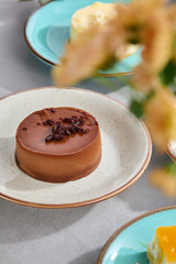 Delicious Chocolate Cheesecake on Plate: A Tempting Dessert Close-Up