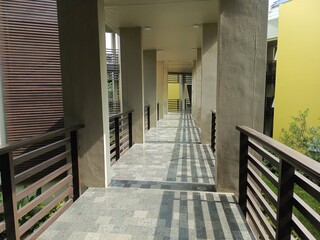 Photo of a hotel hallway or outdoor building