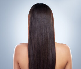 Woman, back and hair care in studio with beauty for luxury salon treatment, shampoo and cosmetics....