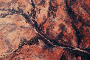 Abstract Aerial View of Desert Terrain With Red Rocks and Dirt Textures Patterns Kimberley Broome...