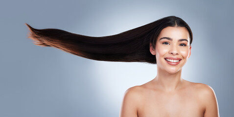 Hair care, happy and portrait of woman in studio with natural, beauty and salon treatment. Smile,...