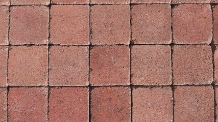cobbles background of red square stone floor texture
