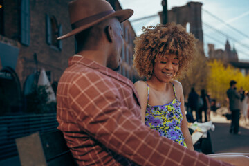 A stylish couple enjoying a sunny day outdoors