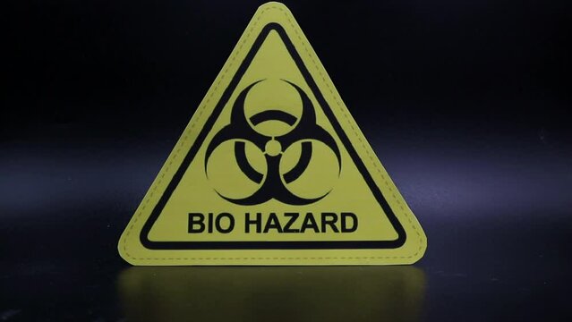 Zooming towards a Bio Hazard sign, isolated on black background