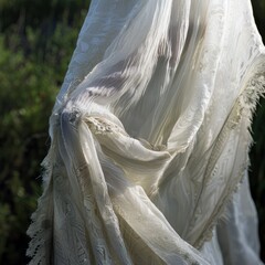 Sunlit White Garment Swaying in Gentle Breeze
