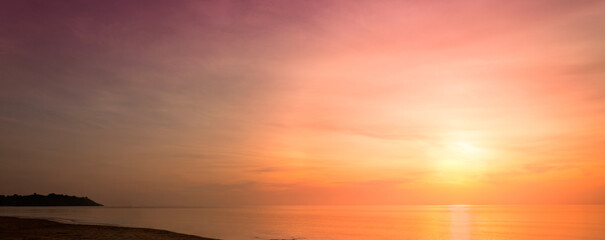 Enjoy a panoramic view of the skyline. The sun rises in the morning sky with colorful clouds. and beautiful cloud patterns In the soft light of the morning	