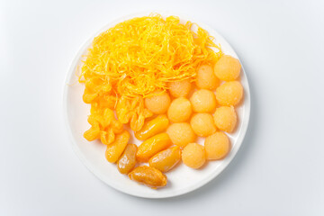 Thong Yip and Thong Yot traditional Thai desserts Presenting the bright colors and cultural essence of Thai desserts in a beautiful food photography environment.