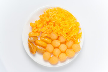 Thong Yip and Thong Yot traditional Thai desserts Presenting the bright colors and cultural essence of Thai desserts in a beautiful food photography environment.