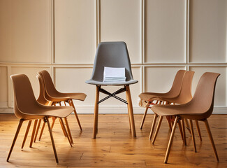 Empty chairs in inviting room, for communal interaction