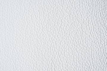 White natural leather textured background.