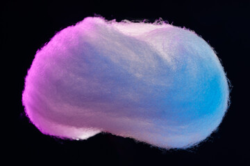 Small cloud of cotton on black background