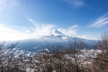 Snow covered Mt Fuji from Kawaguchiko Tenjozan Park in Winter