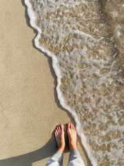 feet on the beach