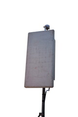 Old antennas for macrocells are mounted on pole on white background