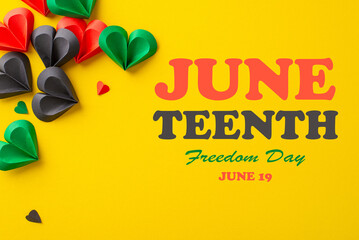Celebratory top view image capturing the essence of Juneteenth, hearts in red, green, black on a...