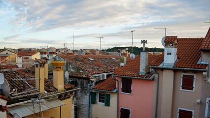 Obraz premium Town with traditional red roofs . Tiled rooftops and facades with from above 