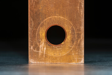 Copper Flat Pure Electrical Busbar on Metal Surface Macro View