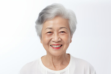 Smiling senior asian woman on white background. Topics related to old age. Asia. China. Japan. Retirement home. Grandmothers day . Retirement. Image for Graphic Designer. Senior residence. AI.
