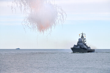 Russian warship fired decoy flares for self defense, sailing at sea military ship used anti missile...