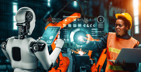 MLB Mechanized industry robot and human worker working together in future factory. Concept of...