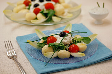 Potatoes salad with blue cheese.