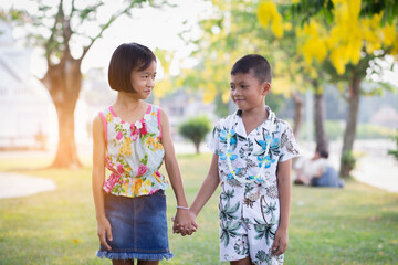 Children play in the summer sunny garden