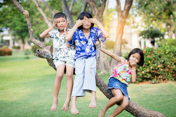 Children play in the summer sunny garden