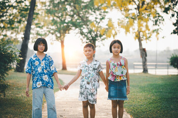 Children play in the summer sunny garden