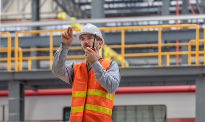 A locomotive engineer manager trains staff, coordinates teams, dispatches work orders and schedules