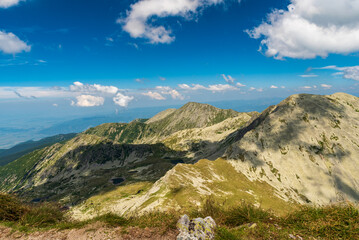 Retezat mountains with Papusa mountain peak from Peleaga mountain peak in Romania