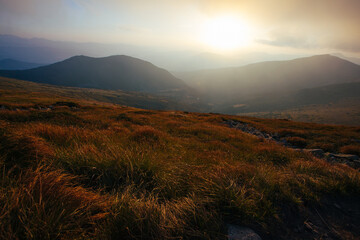 Fototapeta premium Amazing sunset in Ukrainian Carpathian mountains , Chornigysrsyi hrebet range